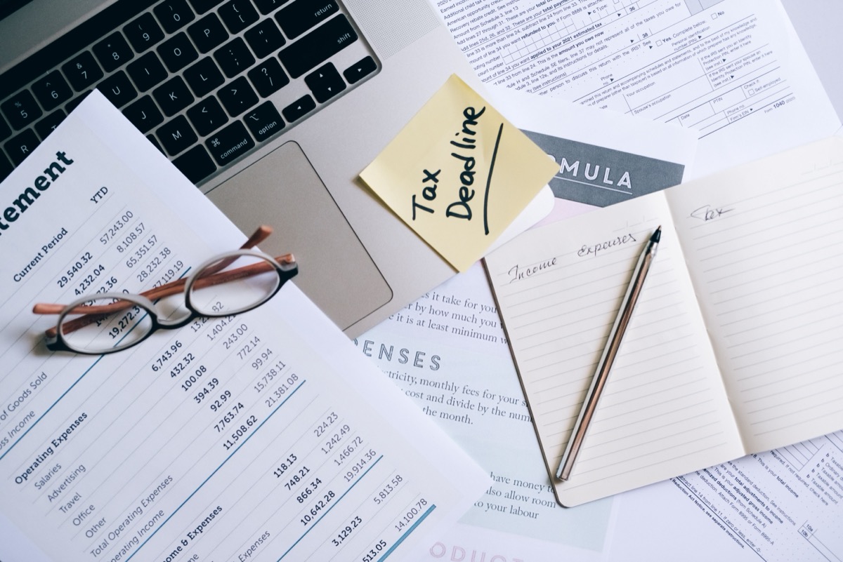Tax documents and deductions paperwork for therapist in private practice